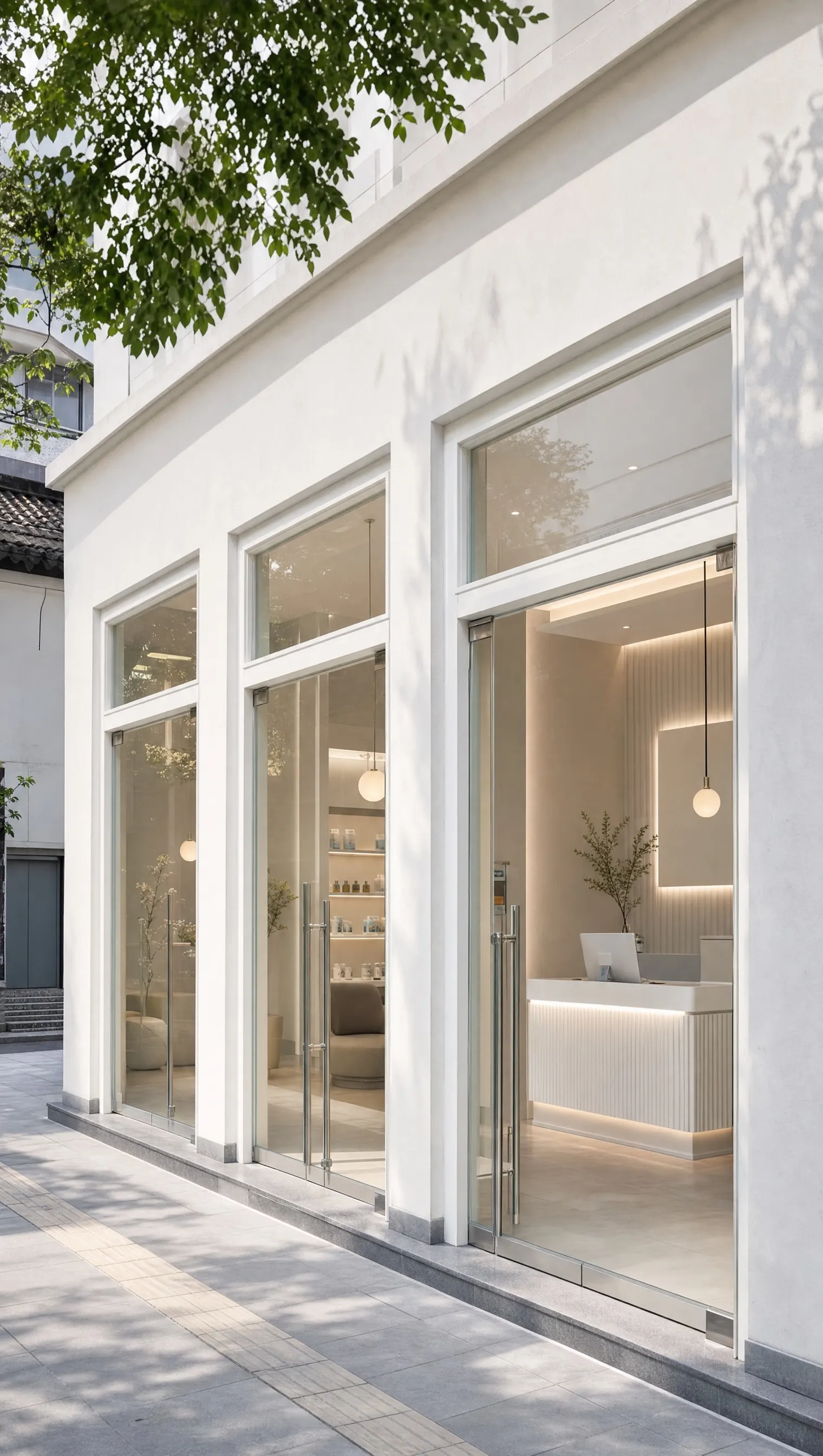 Three clinic shopfronts in a row on a bright street