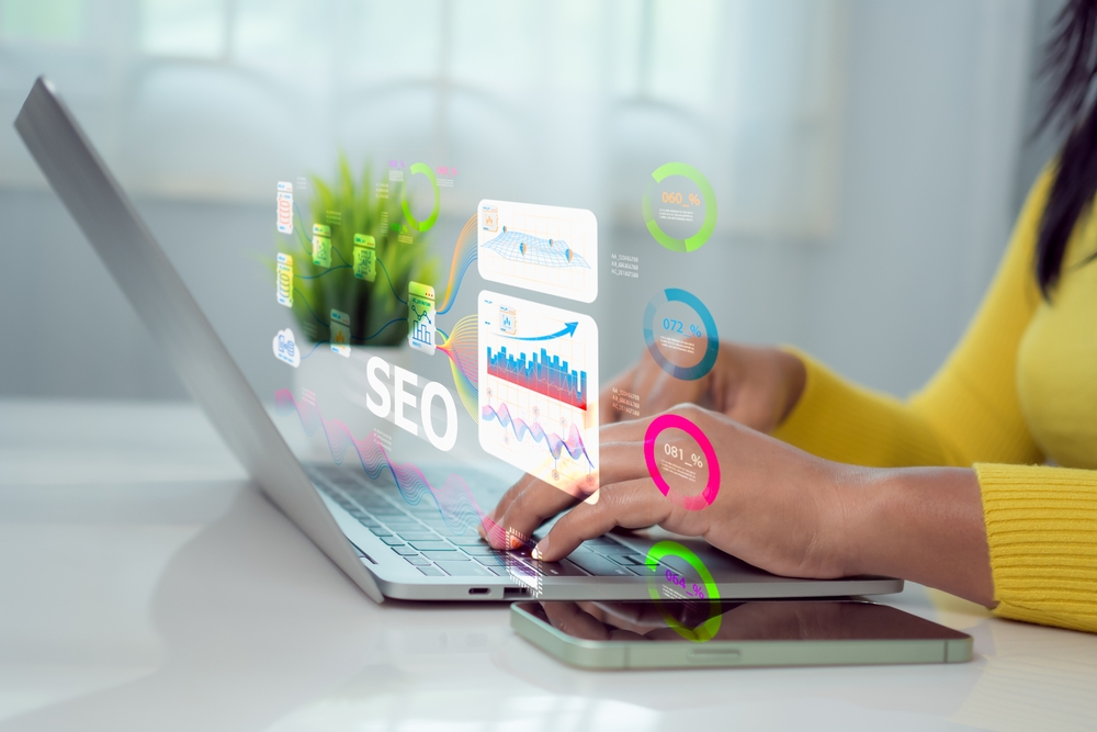 Specialist analysing branded and non branded keywords for AI SEO