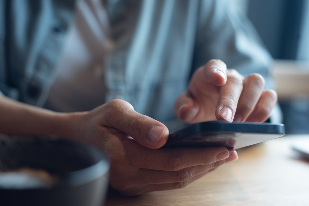 A brand placing a WhatsApp button on a landing page so customers can start a conversation